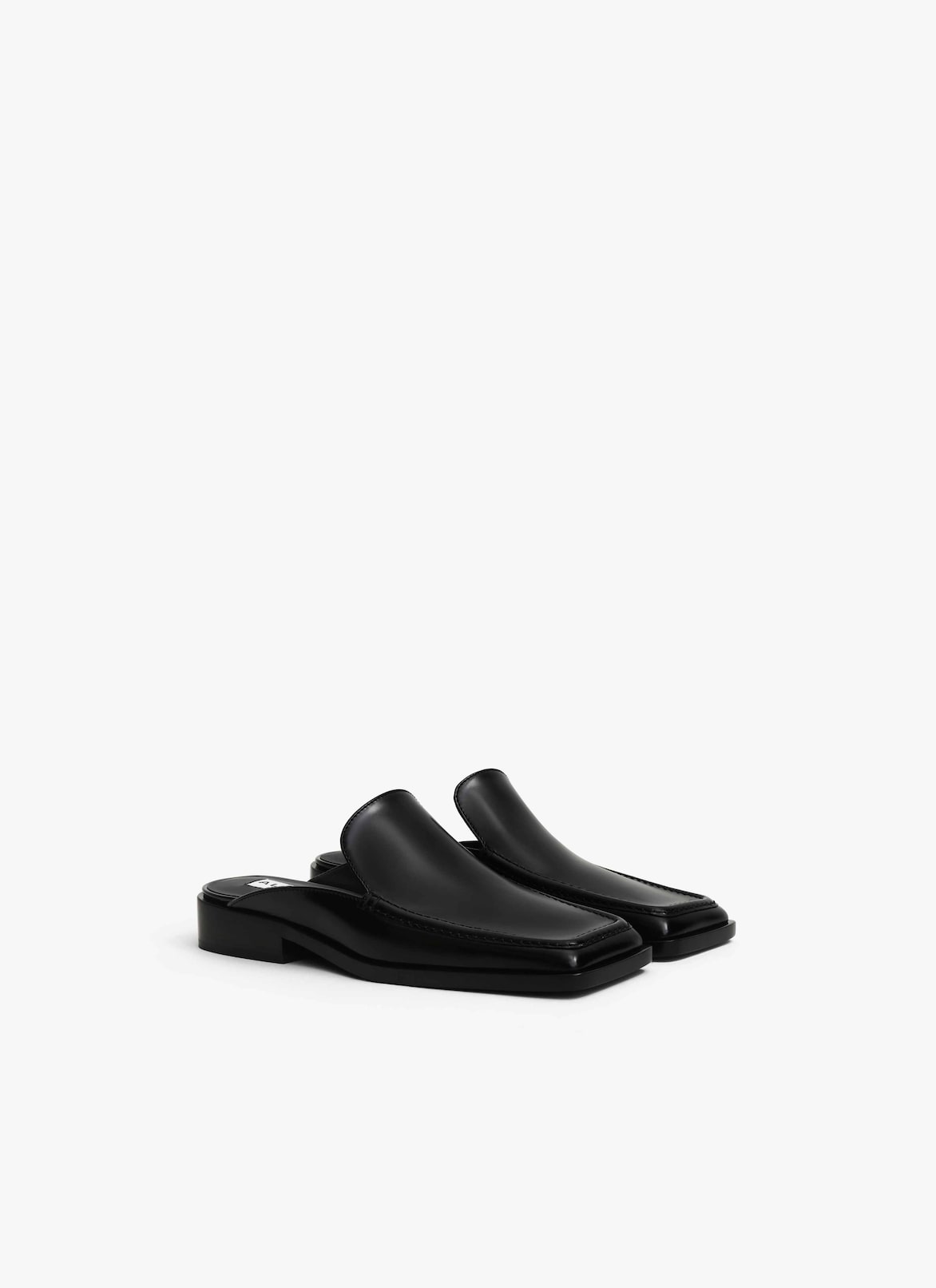 SQUARE LOAFER MULES IN CALFSKIN ALAÏA BLACK SQUARE LOAFER MULES IN CALFSKIN